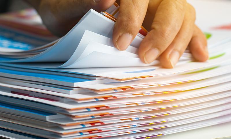 Businessman,Hands,Searching,Unfinished,Documents,Stacks,Of,Paper,Files,On